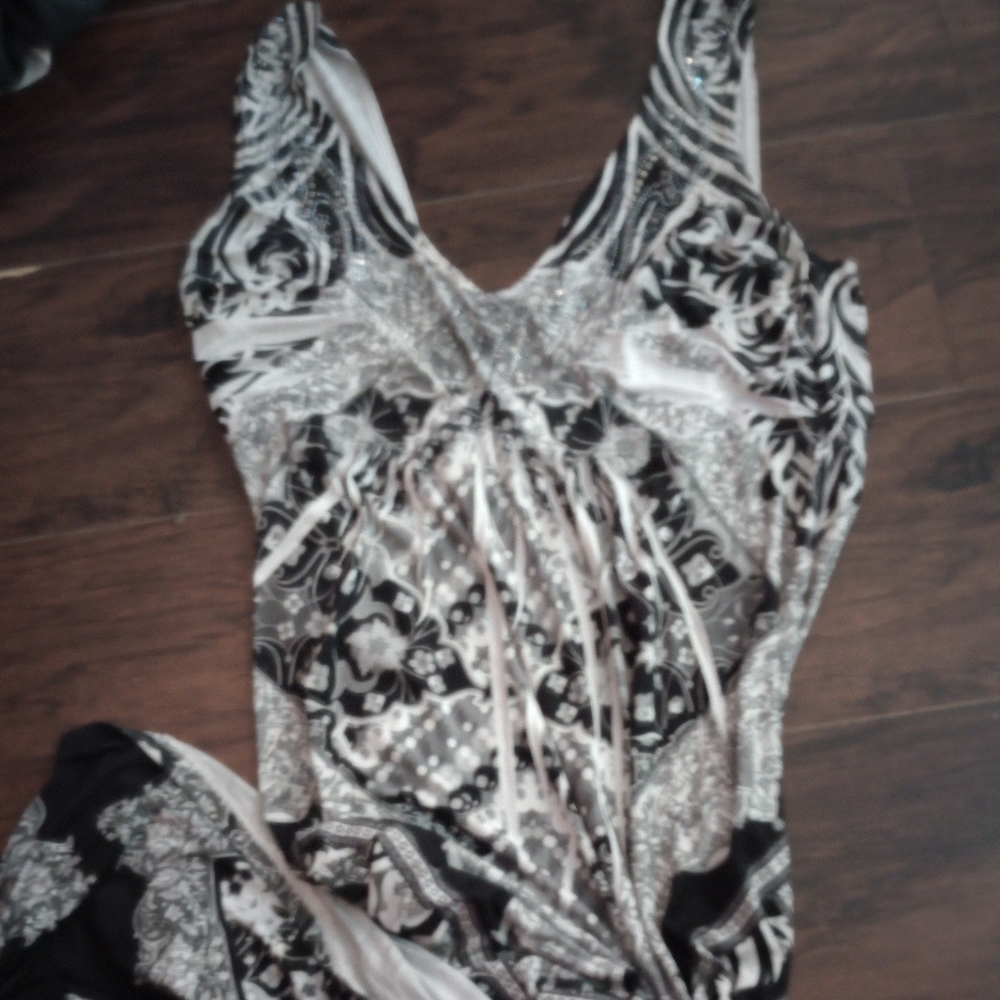 A BEAUTIFUL BEADED SIZE LARGE, MAXI DRESS.